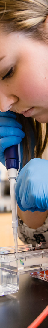 Female biology student in lab